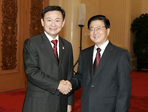 他信·西那瓦在中国与黄菊握手 他信·西那瓦在中国与黄菊握手
