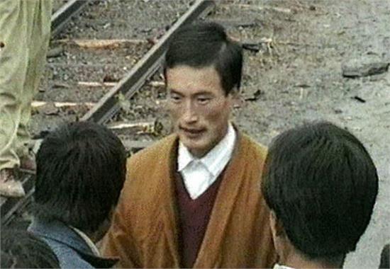 孟照国